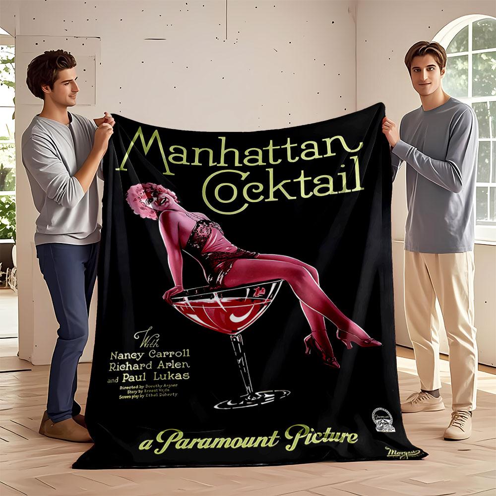 A woman in pink sits atop a cocktail glass on a black vintage poster. for all seasons blanket lunch break throw gift