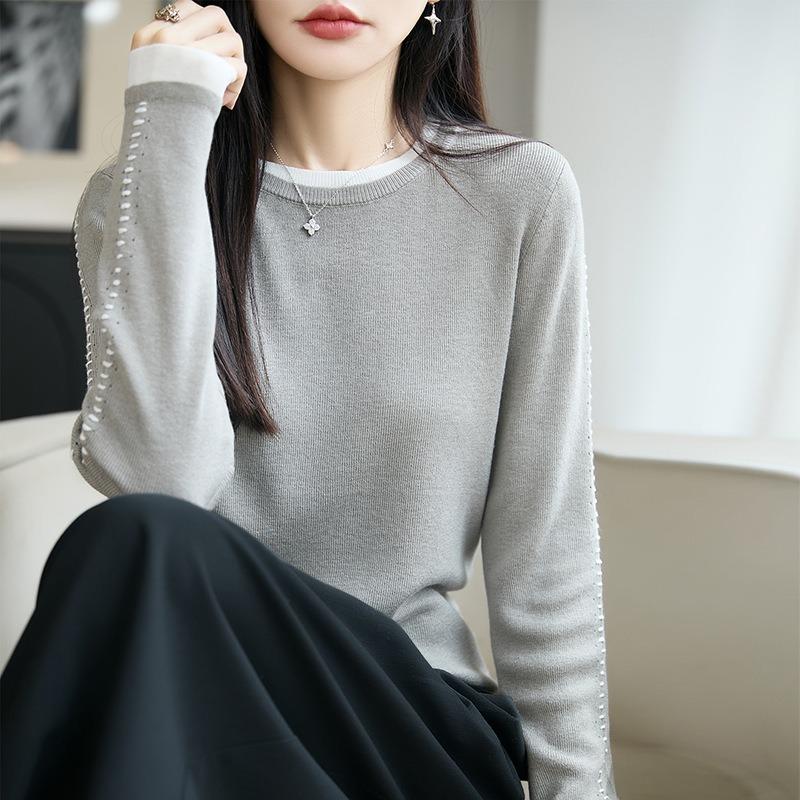 Autumn and winter worsted wool sweater crew neck knitted sweater long sleeve women's color matching loose pullover bottoming shirt top