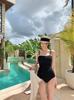 South Korea ins Dongdaemun fashion swimsuit triangular one-piece solid color simple meat cover and thin chest swimsuit