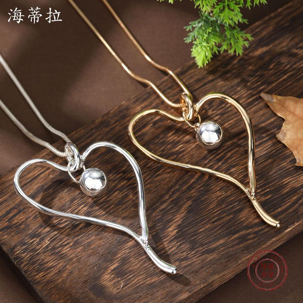 Новый полый преувеличенный геометрический кулон в виде сердца, женское длинное ожерелье с полым сердцем