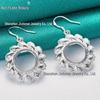 Серебряные серьги-кольца с резным узором для женщин