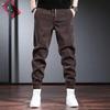 Men's Black Corduroy Plus Velvet Thickened Tapered Casual Pants for Autumn and Winter.