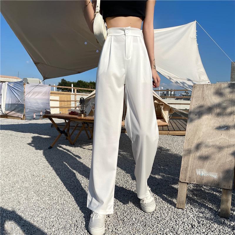Женские белые широкие летние брюки с высокой талией — узкие, драпированные, прямые и свободные.