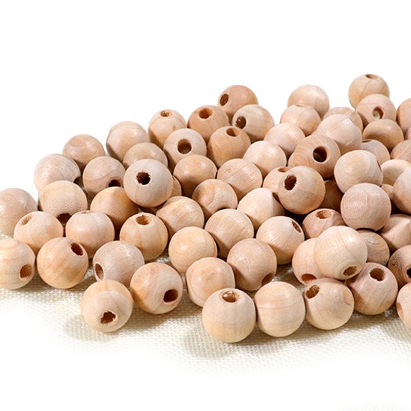 Natural Camphor Wood Balls: Mildew & Moisture-Proof Insect Repellent, Odor-Removing Beads (1.8cm) for Wardrobe.