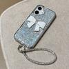 For iPhone 16 Case Large Bowknot Electroplated Glitter Epoxy Shockproof Phone Cover with Strap - White