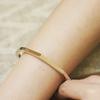 CALVIN KLEIN Stainless Steel Gold Plated Steel Trendy, Versatile, Fashion Bangle Women's 35000047