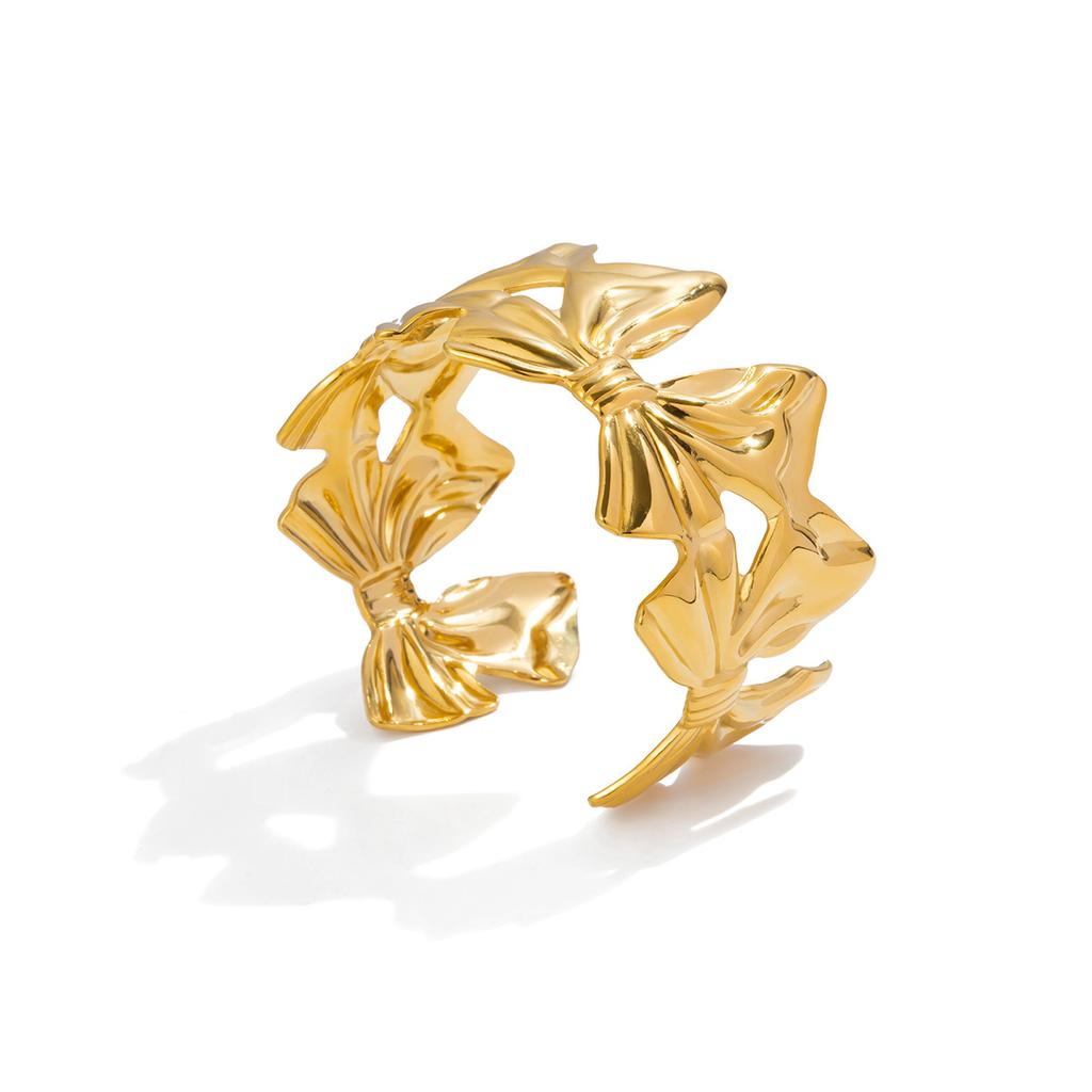 Сладкий и романтичный дизайн, ювелирное изделие - браслет-бант из золота 18 карат