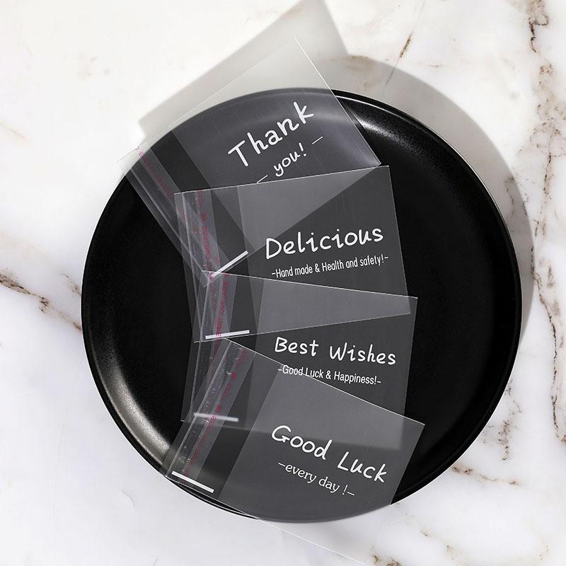 100 шт. Английский печатный 4 в 1 матовый самоклеящийся самоклеящийся DIY бисквит печенье снежинка кондитерские упаковочные пакеты