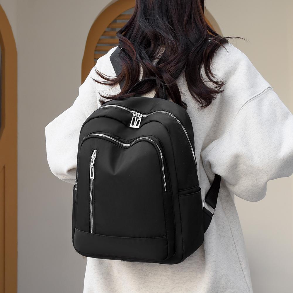 Рюкзак на молнии. Женский легкий рюкзак. Рюкзак для путешествий большой емкости.