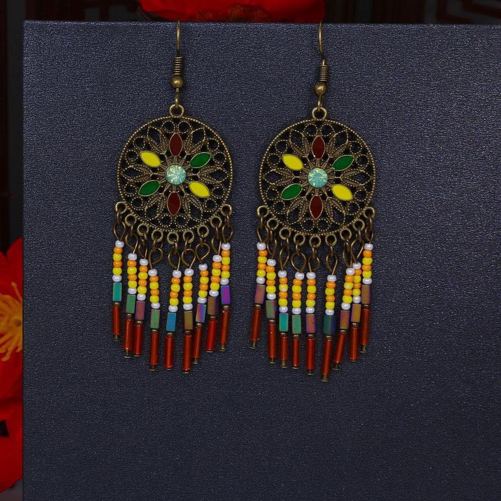 Серьги-кисточки с рисовыми бусинами и каплями воды в стиле бохо - этнический стиль, яркая индивидуальность