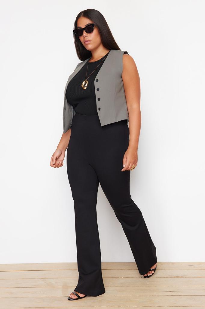 Женские стильные черные трикотажные брюки с расклешенной талией больших размеров для похудения