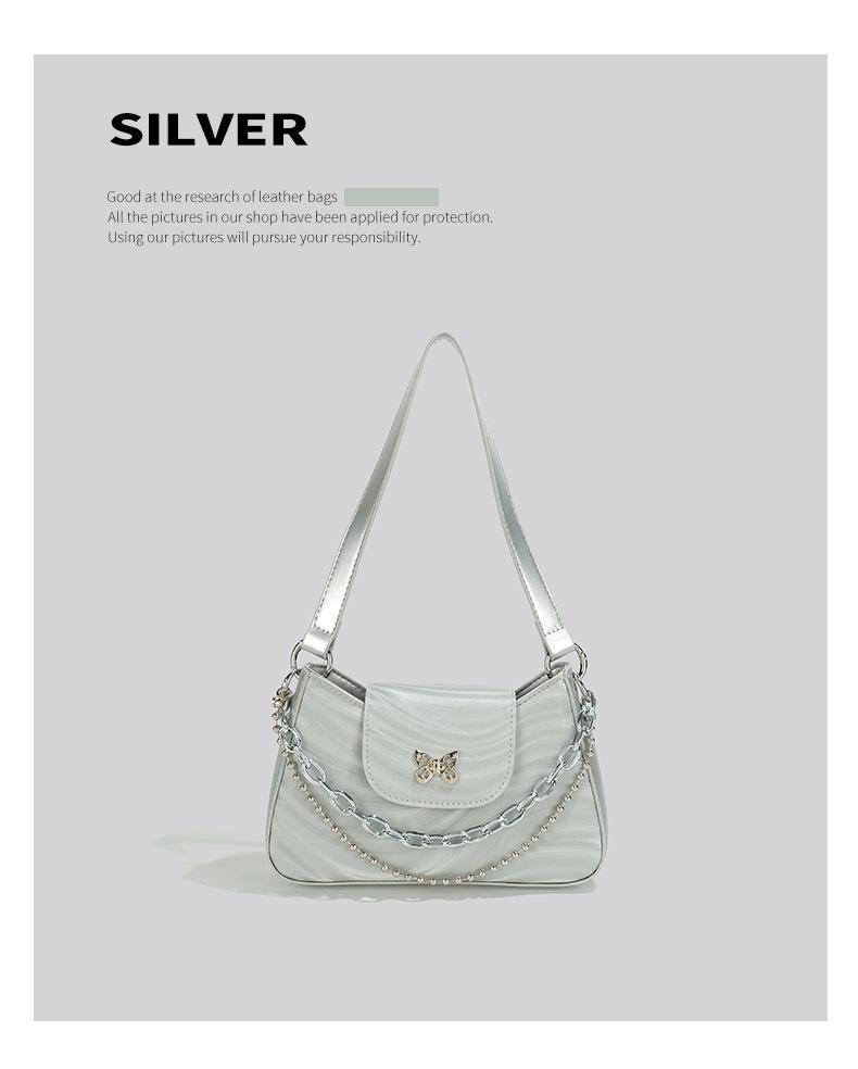 Трендовая женская сумка-багет подмышку 2025 года с высококачественной текстурой и нишевым дизайном