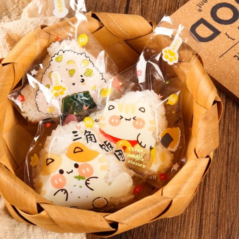 50 шт. обертки для онигири с мультяшным узором, японские треугольные, из морских водорослей, для суши, бенто, одноразовые упаковочные пакеты, форма для приготовления, аксессуар для бенто