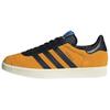 Gazelle '75-летие' (унисекс) Кроссовки для скейтборда Team Collegiate Gold 2 / Core Black / Cream White JP5283