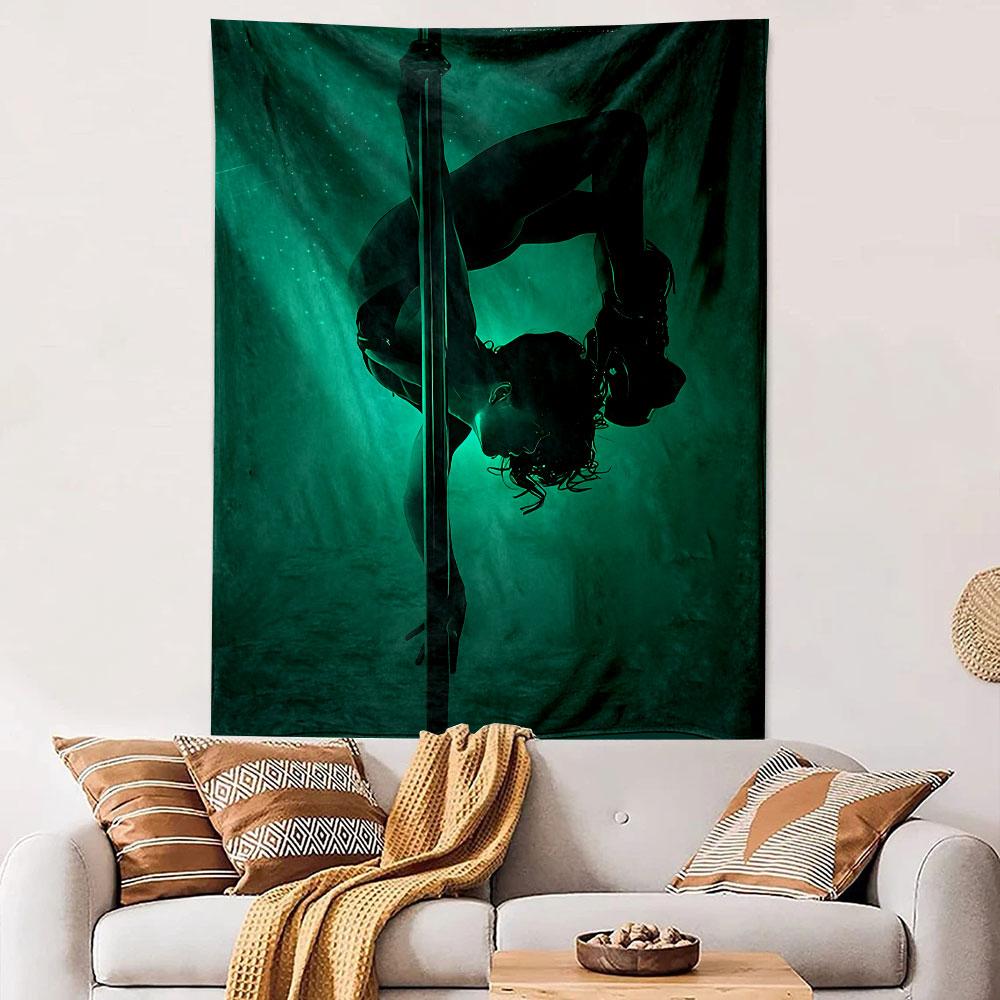 A silhouetted figure performing pole acrobatics under green lighting. Patterned tapestry for bedroom and living room home decor