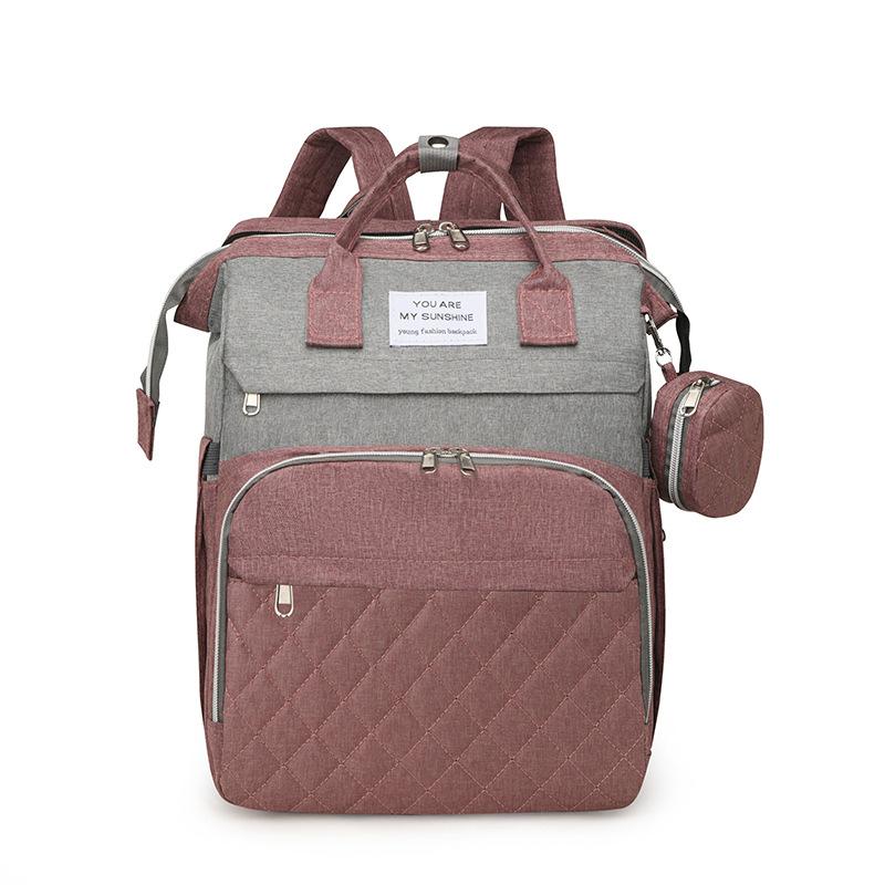 Large-capacity diaper bag, multifunctional folding baby bed bag, portable mommy bag, and backpack for organizing essentials