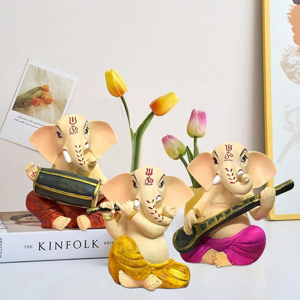 Сидящий Ганеша с музыкальными инструментами Декоративная статуэтка для домашнего декора - (Набор из 3 предметов, разноцветный)