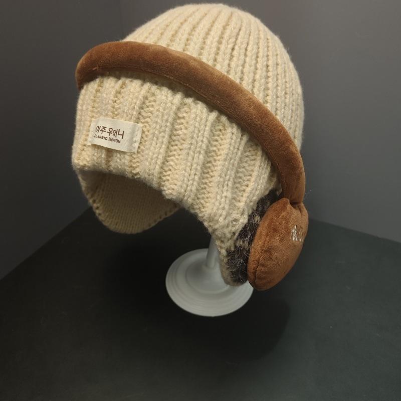 Early autumn new fashionable versatile cute earphone decoration fashionable versatile knitted hat outdoor windproof ear protection wool hat