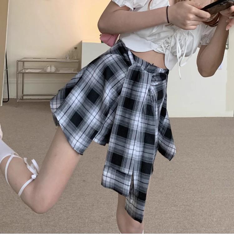 Женская черная клетчатая юбка-шорты А-силуэта 2025 года с асимметричным дизайном из двух частей