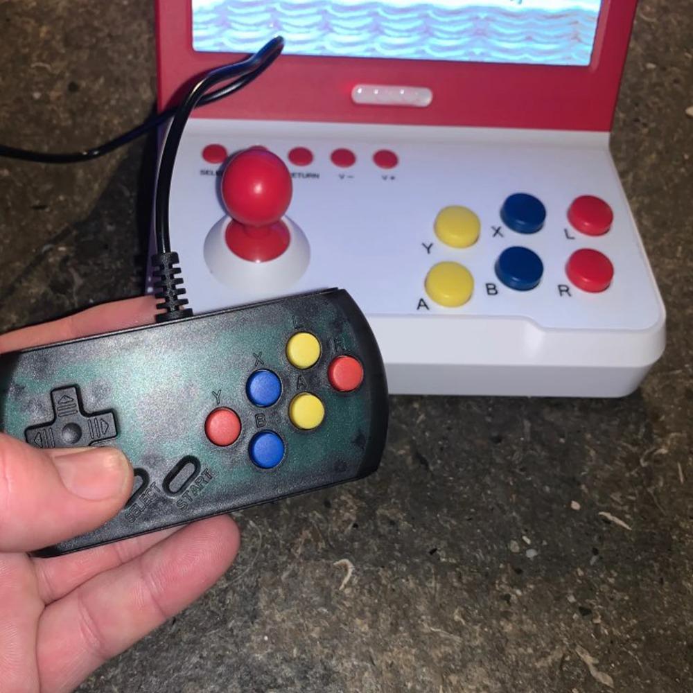 Q70 Retro Arcade 7 Inch Build-in 9000 Video Classical Games Skillful Design Exquisite Appearance Mini Game Console Player