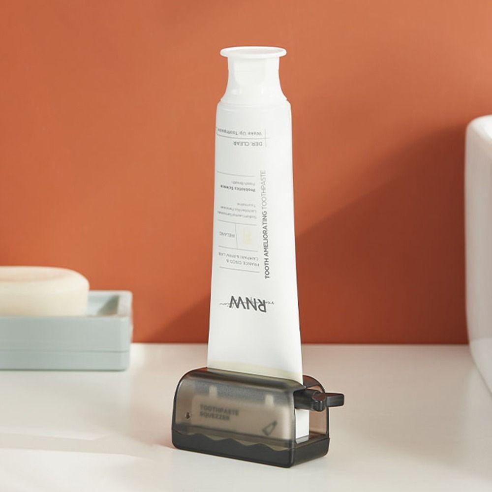Пластиковый ручной выдавливатель зубной пасты Портативная стойка для хранения зубной пасты Аксессуары для ванной комнаты