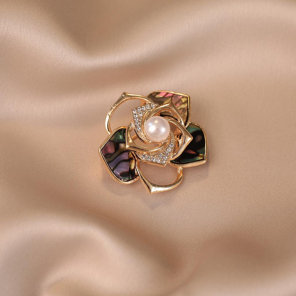 A Delicate Pearl Garland Brooch with A Little Design Elegant and Fashionable for Women and A Sweet New Camellia Corch