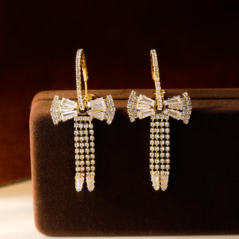 European and American exaggerated celebrity zircon butterfly earrings, women's high-end sense light luxury long earrings, niche retro earrings, earrin