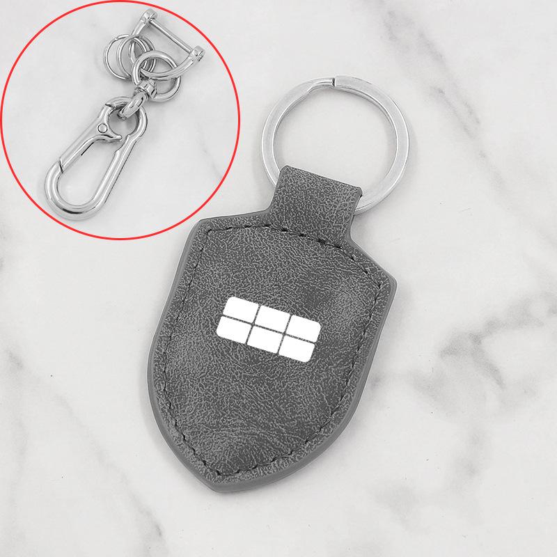 Брелок Geely Galaxy e5 L6 L7 Xingjian 7 с подвеской-щитом из углеродного волокна и кожи