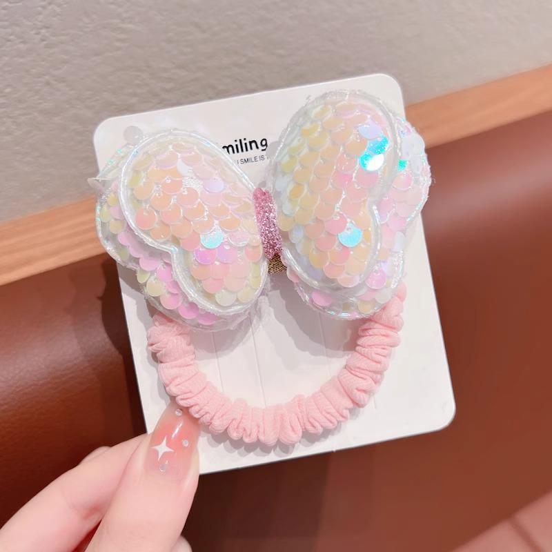 Детская резинка для волос с пайетками в виде бабочки не повредит волосы. Идеально подходит для высоких хвостов или в качестве головного убора для девочек.