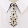 Small Tie with Colored Diamonds and Metal On White EMA