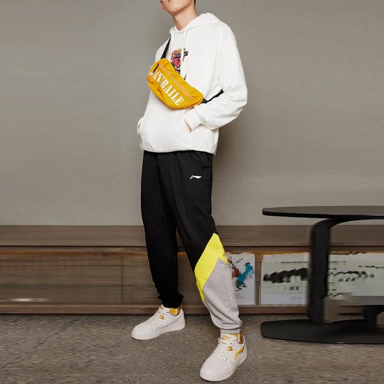 Li Ning Sports Fashion Series Logo Print Color Block Loose Fit Cuffed Knit Joggers Men Joggers Black AKLRC05-3