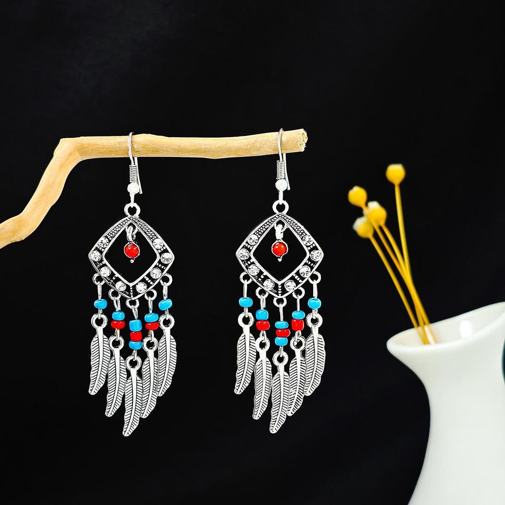 European and American Retro Hollow Turquoise Tassel Bohemian Earrings for Women