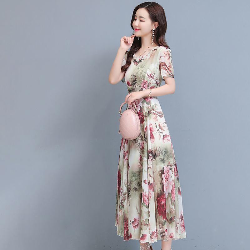 New Elegant Floral Fashion Dress Women's Summer Fashion Cover Belly Slim Long Flowing Dress Beach Skirt.