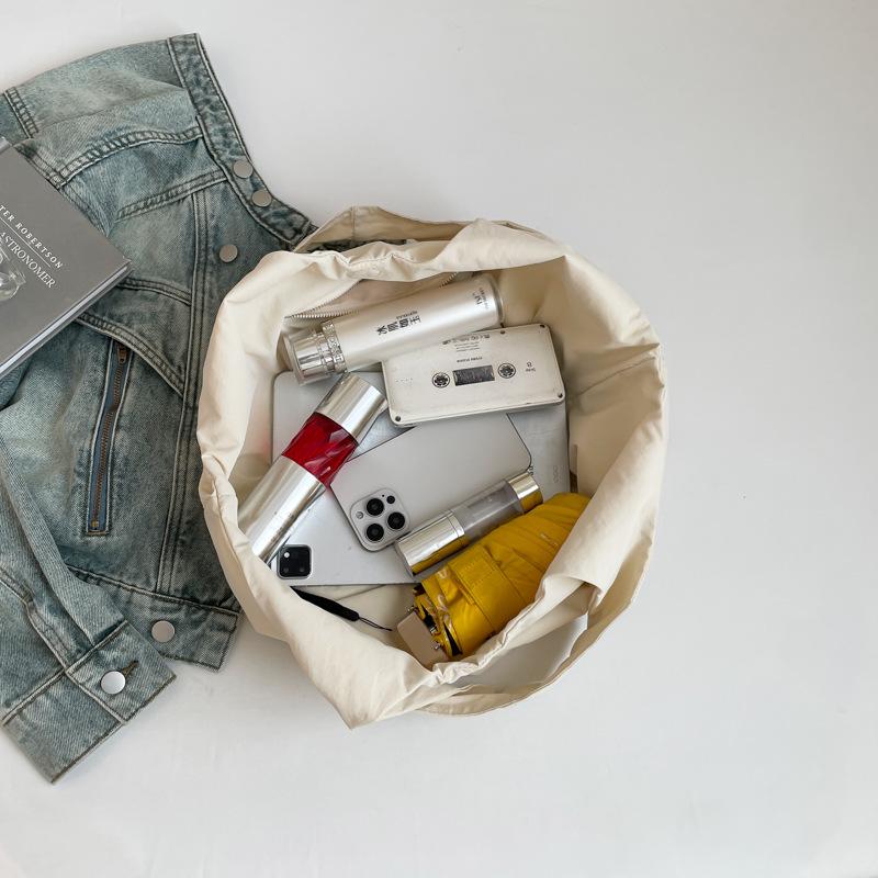 2025 новая подмышечная тканевая сумка большой вместимости женская рисовая однотонная модная повседневная наплечная сумка простая текстура хозяйственная сумка