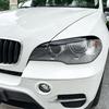Накладки на фары "брови" для BMW X5 E70 30d 48i 30i 35d 40d 30d 50i 35i M50d 2006-2013 Накладка-стикер на фару
