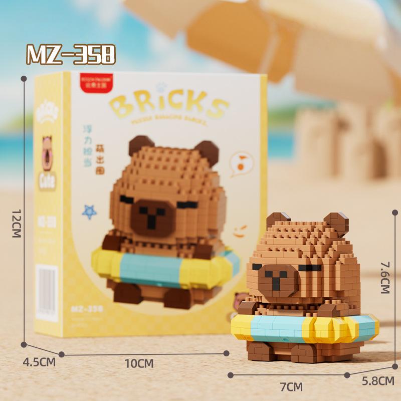 Новые блоки микро-деталей Capigui Pig Развивающие игрушки Милая капибара с плавательным кругом Развивающие повседневные подарки