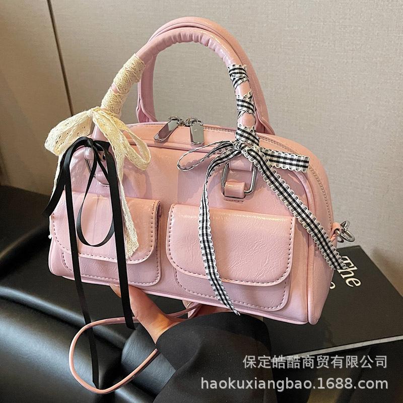 Маленькая сумка в иностранном стиле высокого класса, женская летняя 2025, новая модная нишевая сумка-мессенджер, женская портативная сумка-бостон