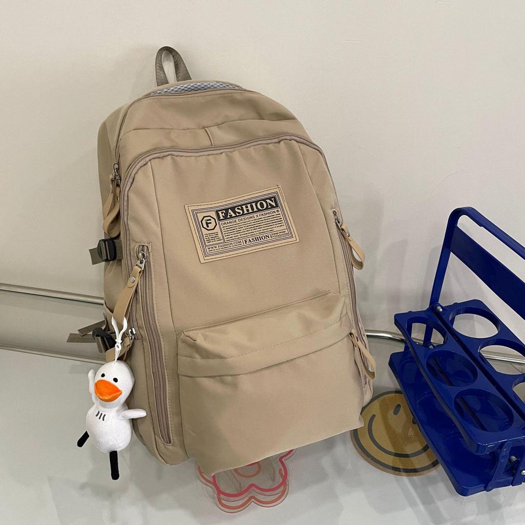 Fashionable Water-Repellent Student Backpack: Trendy High-Capacity Design for Couples