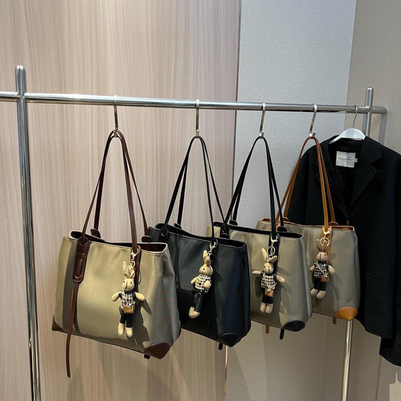 Женская сумка-тоут большой вместимости весна 2024 г.: Простая сумка через плечо и для поездок на работу в стиле нишевой моды