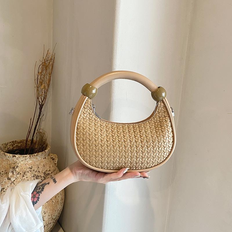 Супер огонь маленькая сумка женская осень-зима 2025 новая ретро плетеная сумка-мессенджер нишевый дизайн портативная сумка-пельмень для通勤