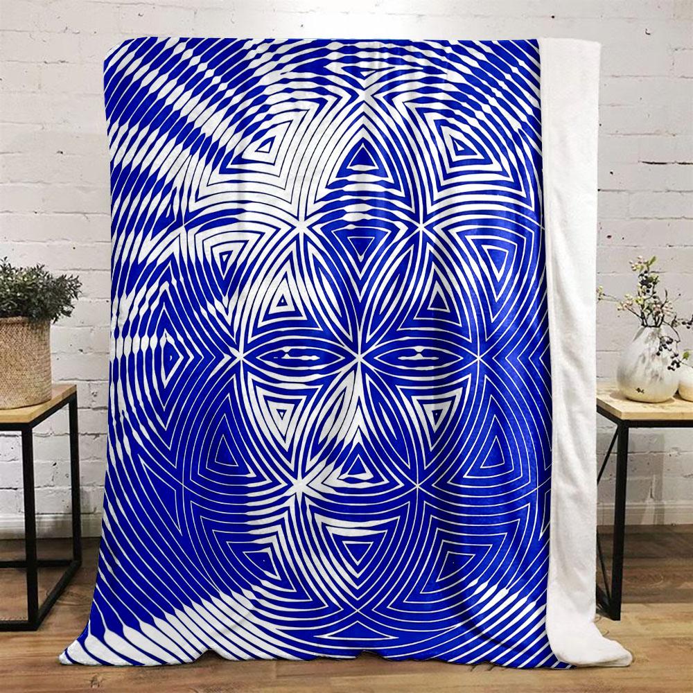 Geometric Face Pattern in Blue and White Patterned flannel blanket perfect for the bedroom living room, sofa, or a little nap