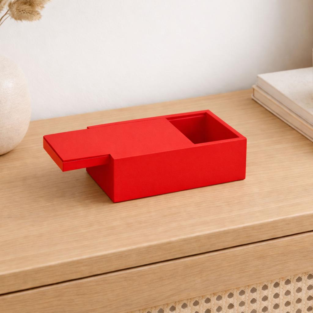 Red organizer box with a sliding lid for small items