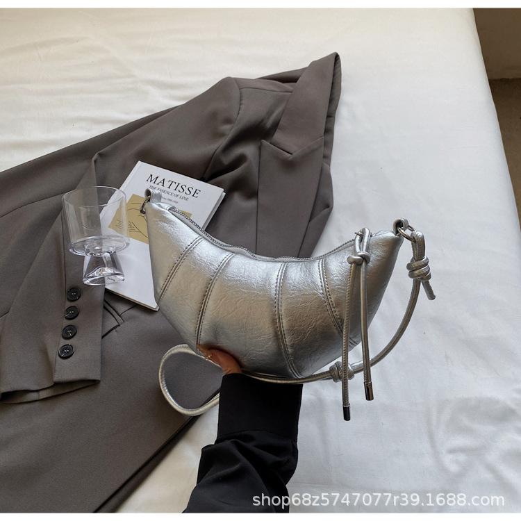 Fashion and leisure high-end sense simple solid color horn bag versatile personality Spice girl style one shoulder messenger women's bag