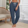 Women's Fashion Solid Color Elastic Waist Pocket Strap Foot Strap Casual Pants