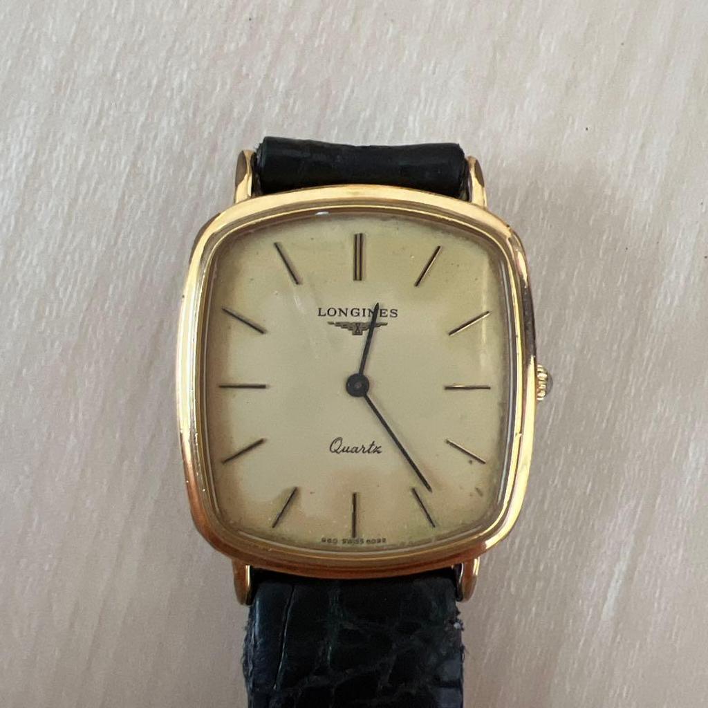 Б/у кварцевые часы LONGINES золотого цвета