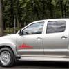 Наклейки на двери и багажник пикапа Toyota Hilux Revo Vigo "Горы"