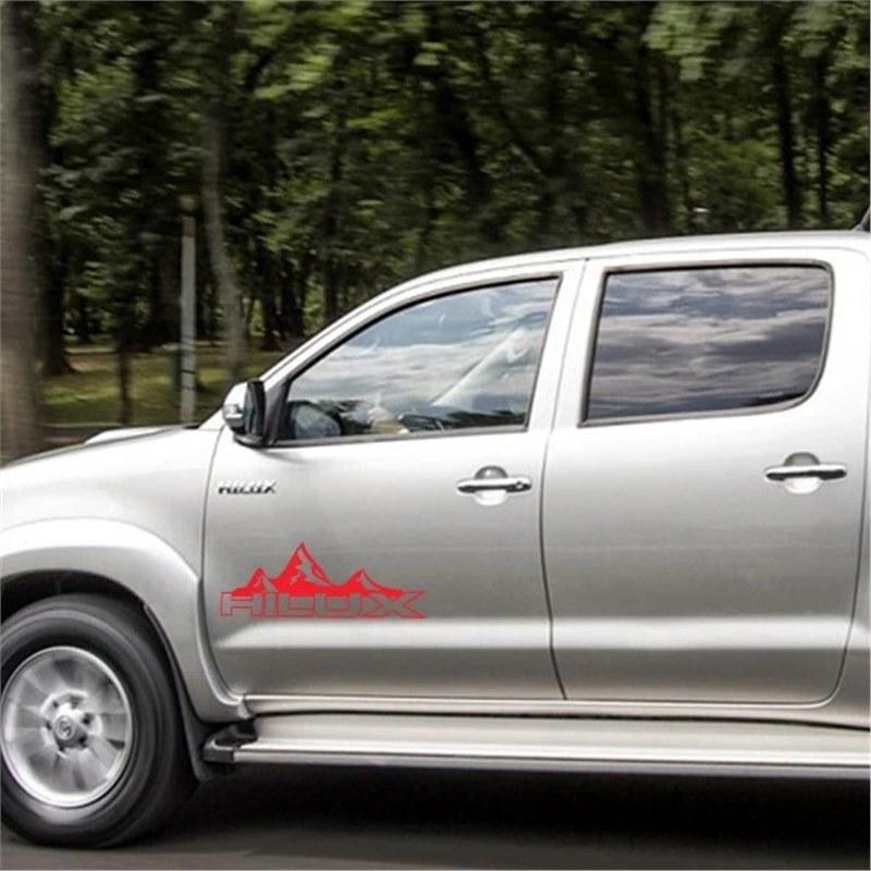 Наклейки на двери и багажник пикапа Toyota Hilux Revo Vigo "Горы"