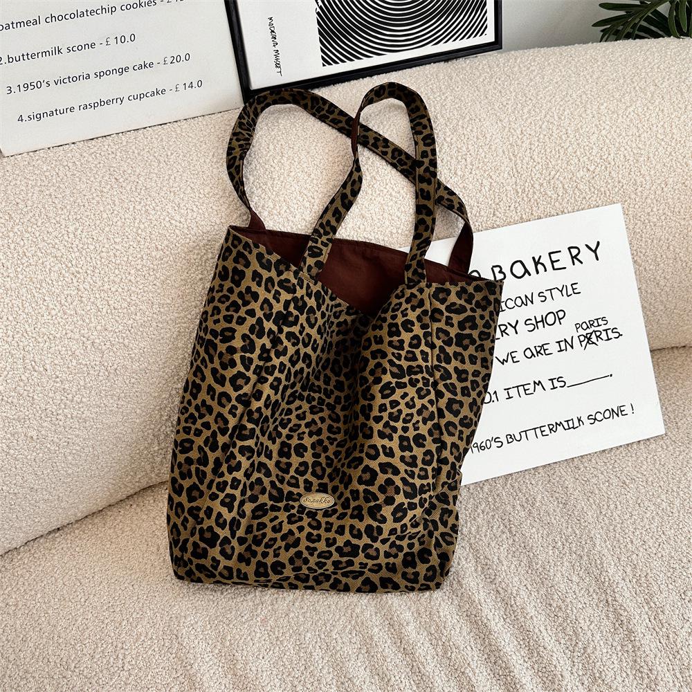 Холщовая сумка с леопардовым принтом: Женская сумка через плечо большой вместимости, коллекция Осень/Зима 2024, новый дизайн двойной сумки.