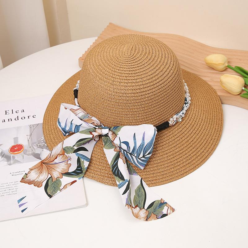 Floral Sun Hat with Bowknot - Wide Brim, UV Protection Straw Cap for Women | Perfect for Summer Beach Vacations & Outdoor Leisure