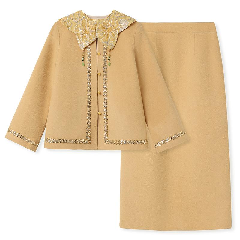 Autumn and winter national style new Chinese temperament heavy industry embroidery design jacket + cloud shoulder skirt two-piece set female NZ111
